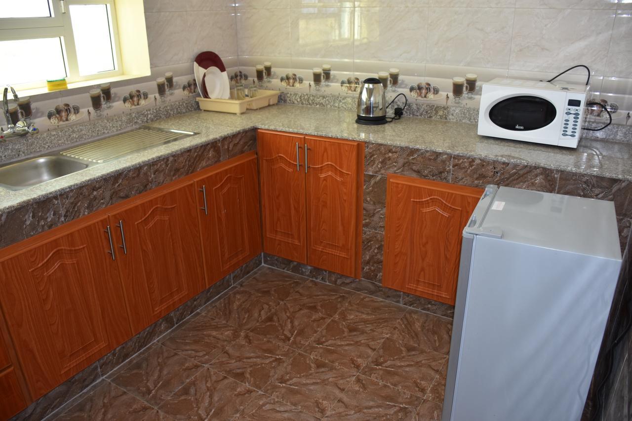 Green Mountain Hotel Apartments Al 'Aqar Buitenkant foto