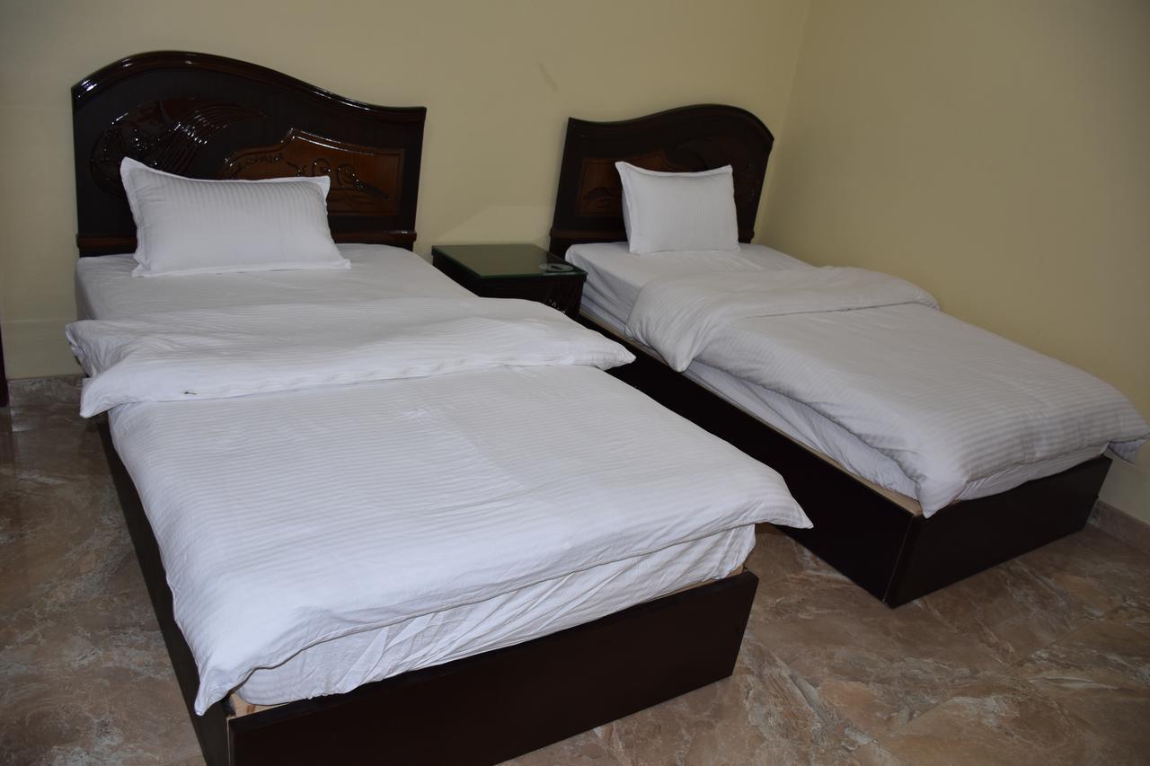 Green Mountain Hotel Apartments Al 'Aqar Buitenkant foto